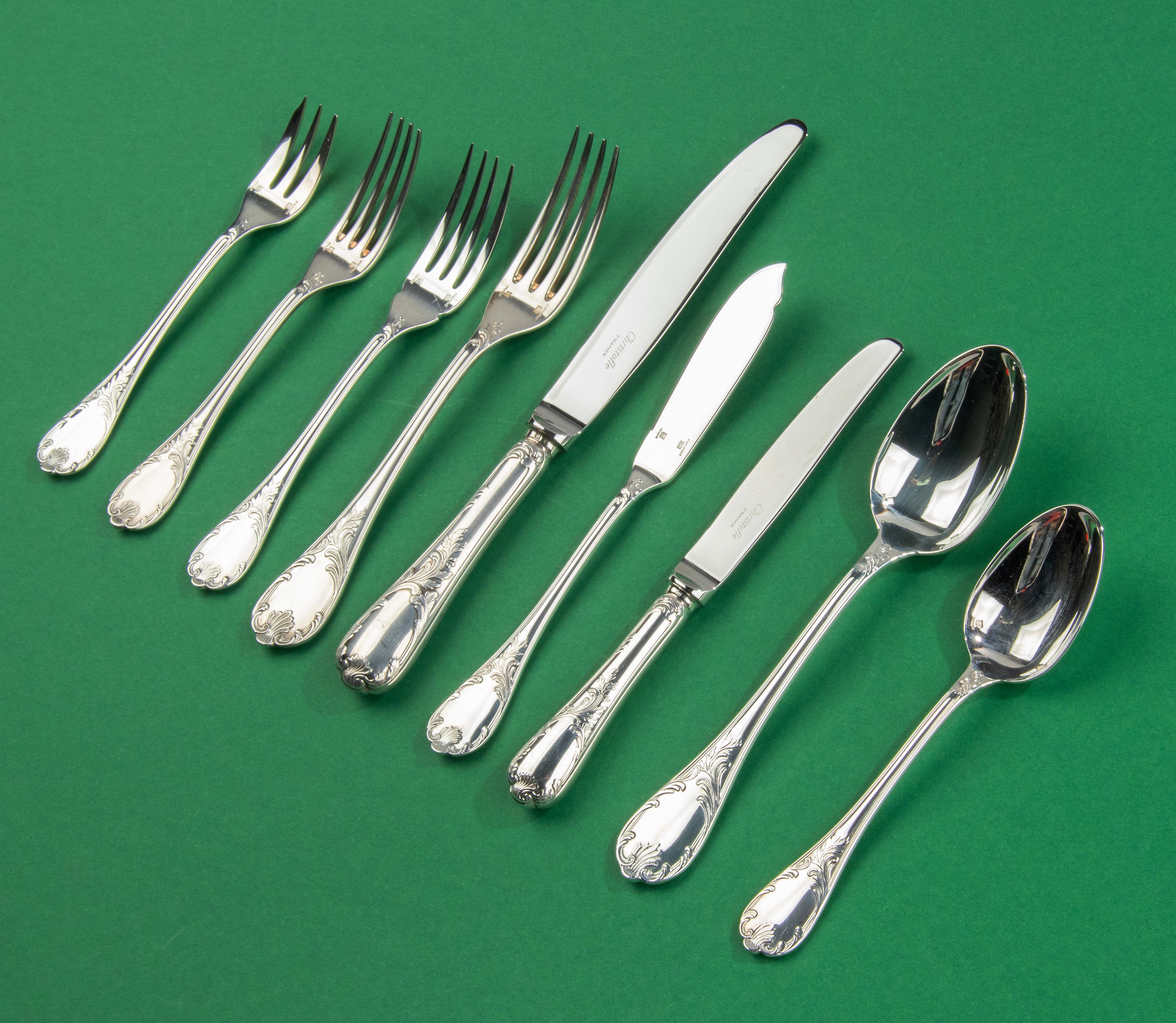 A beautiful set of silver plated flatware for 12 persons, made by the French brand Christofle. The name of the model is Marly. A Classic design in Louis XV style, Marly is one of the most beloved designs from Christofle, that is still available new