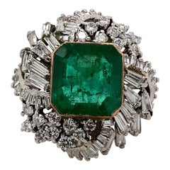 Bague vintage en or blanc 18 carats avec émeraude de 13,00 carats et diamants