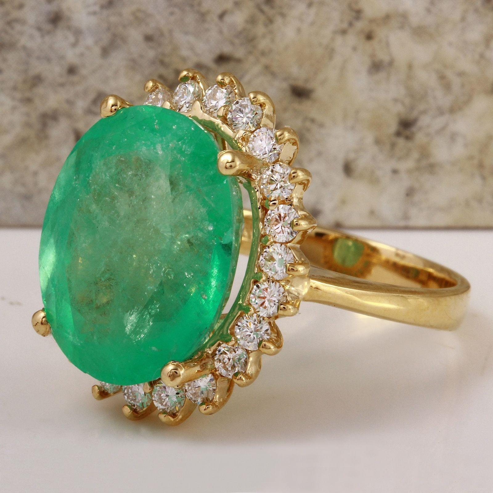 13.00 Carats Natural Emerald and Diamond 14K Solid Yellow Gold Ring

Total Natural Green Emerald Weight is: 12.00 Carats (transparent)

Emerald Measures: 16.27 x 14.42mm

Natural Round Diamonds Weight: 1.00 Carats (color G / Clarity VS2-SI1)

Ring