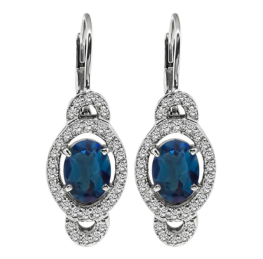 This is a fabulous 18k white gold necklace, earrings and pendant necklace set. The set features lovely oval cut blue topazes that weigh approximately 22.00ct. The topazes are accentuated by sparkling round cut diamonds that weigh approximately