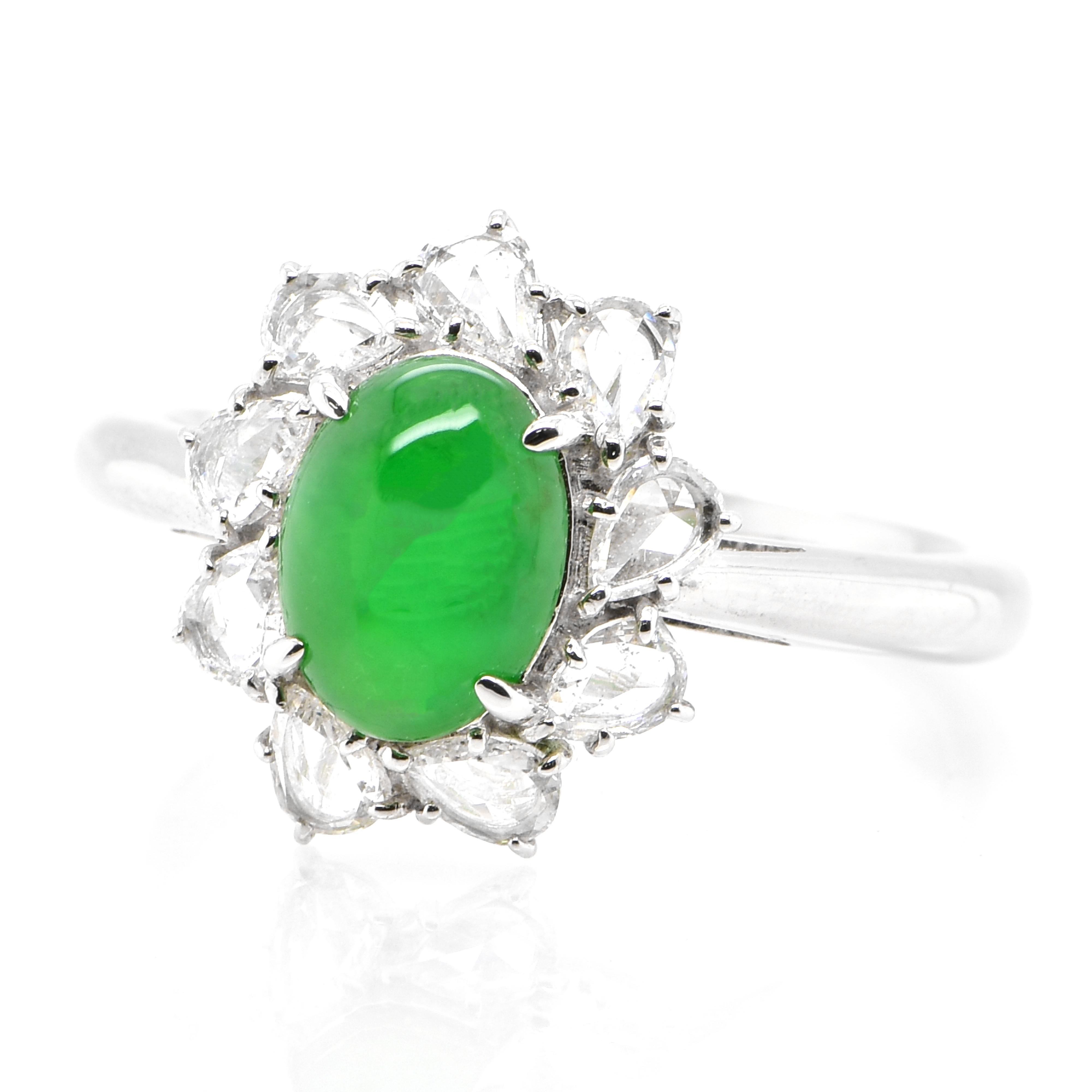 A beautiful Ring featuring a 1.302 Carat, Natural, Non-dyed Jadeite and 0.50 Carats of Diamond Accents set in Platinum. Jadeite has been cherished for millennia. Its nature is pure and enduring, yet sensuous and luxurious. Jadeite’s exceptional look