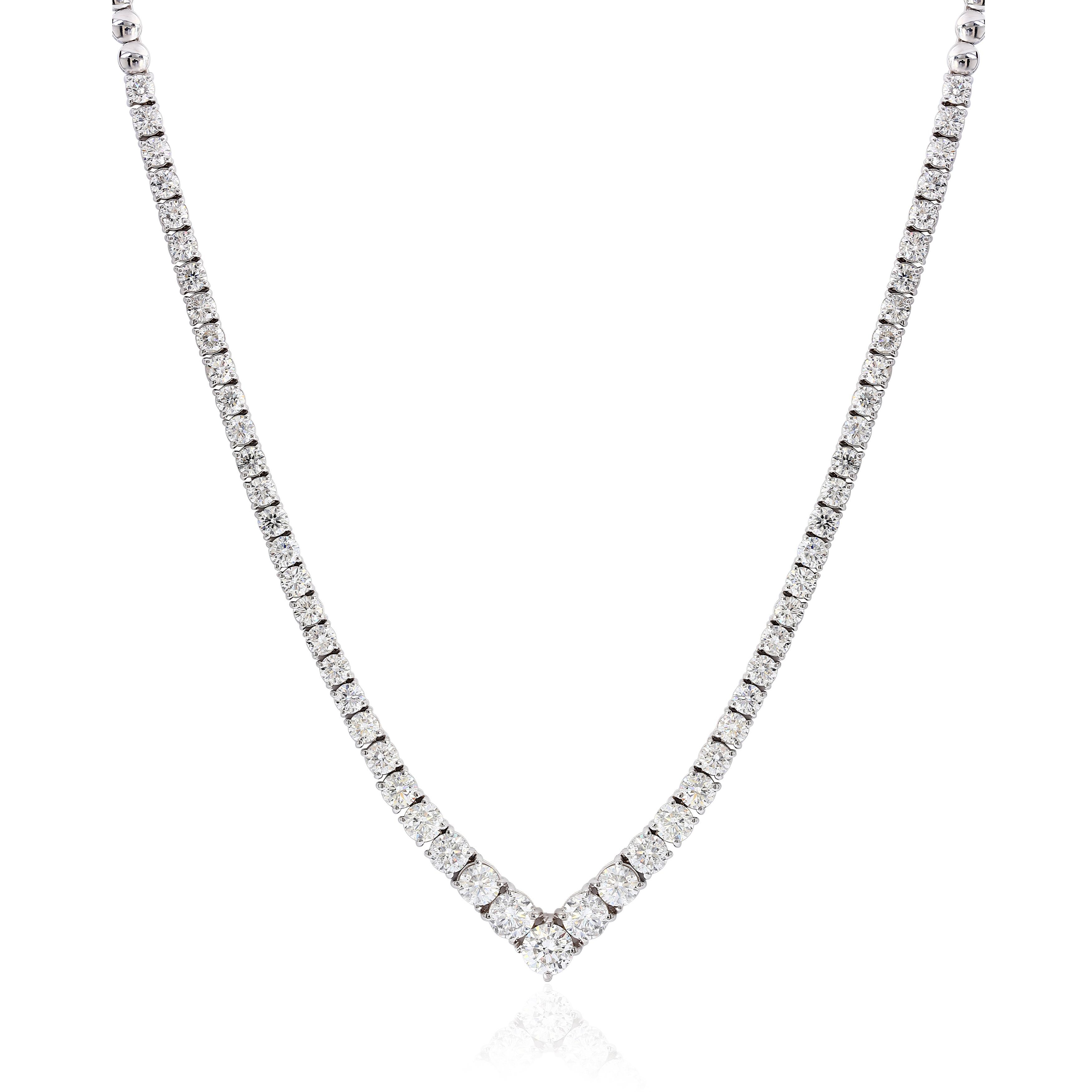A brilliant and classic piece of jewelry showcasing a line of round brilliant diamonds that elegantly get larger to the center of the necklace. Diamonds weigh 13.03 carats total. 

Style available in different price ranges. Prices are based on your