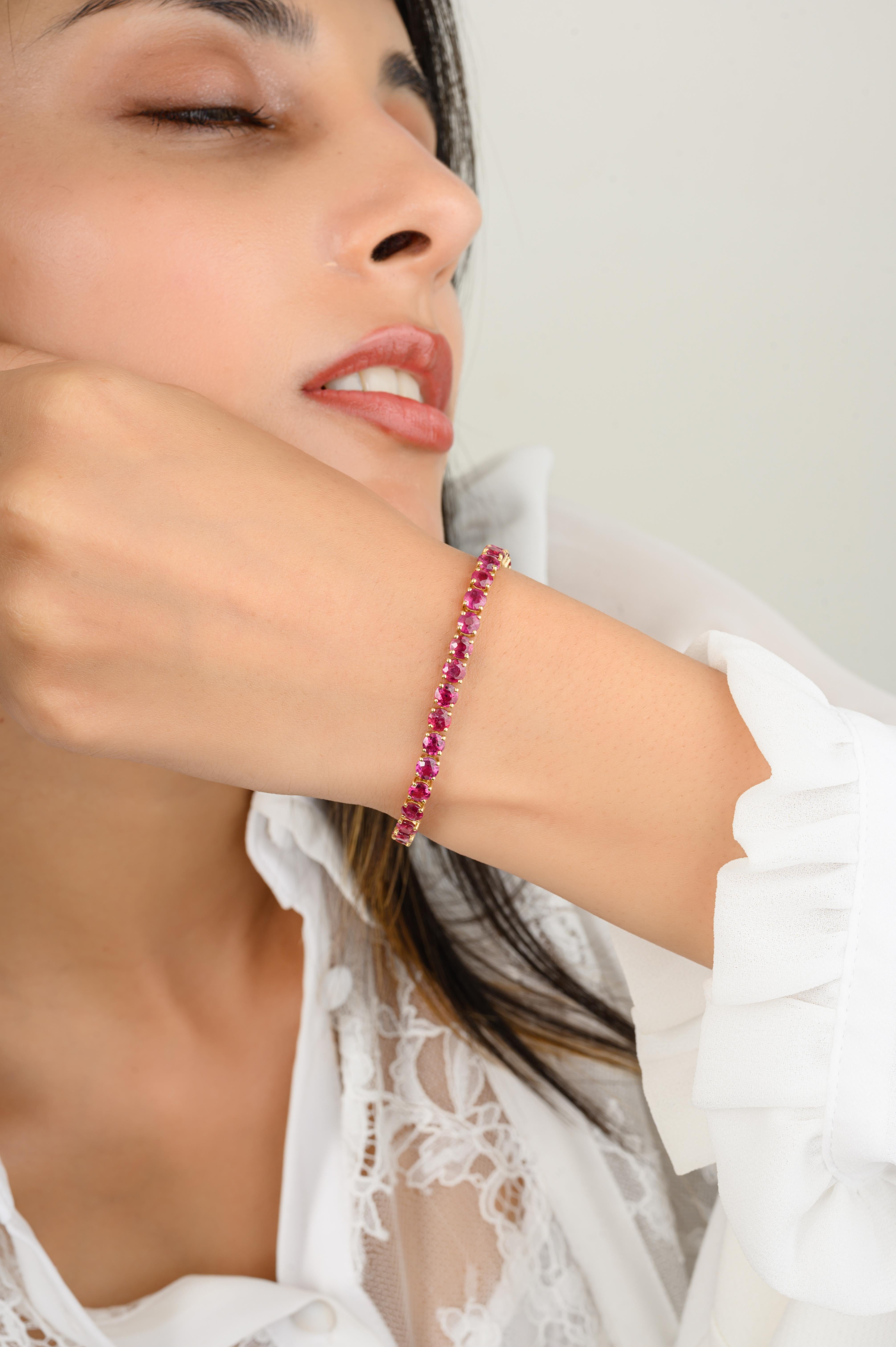 This 13.03 CTW Brilliant Cut Ruby Tennis Bracelet in 18K gold showcases endlessly sparkling natural ruby, weighing 13.03 carats. It measures 7.5 inches long in length. 
Ruby improves mental strength.
Designed with perfect round cut ruby in gold to