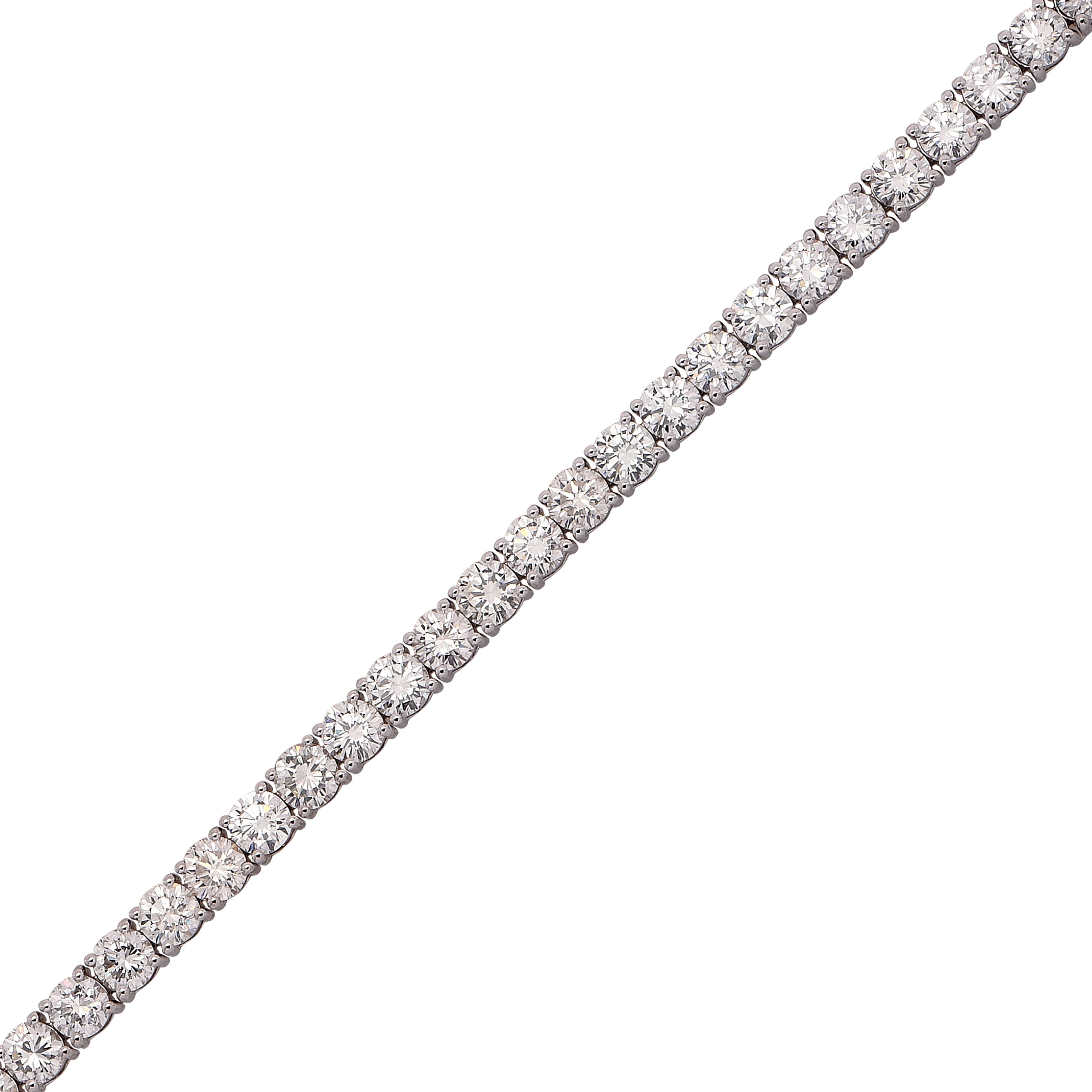 Exquisite diamond tennis bracelet crafted in white gold, showcasing 38 stunning round brilliant cut diamonds weighing approximately 13.04 carats total, G color, SI1 clarity, set in a seamless eternity of diamonds, creating a spectacular symphony of