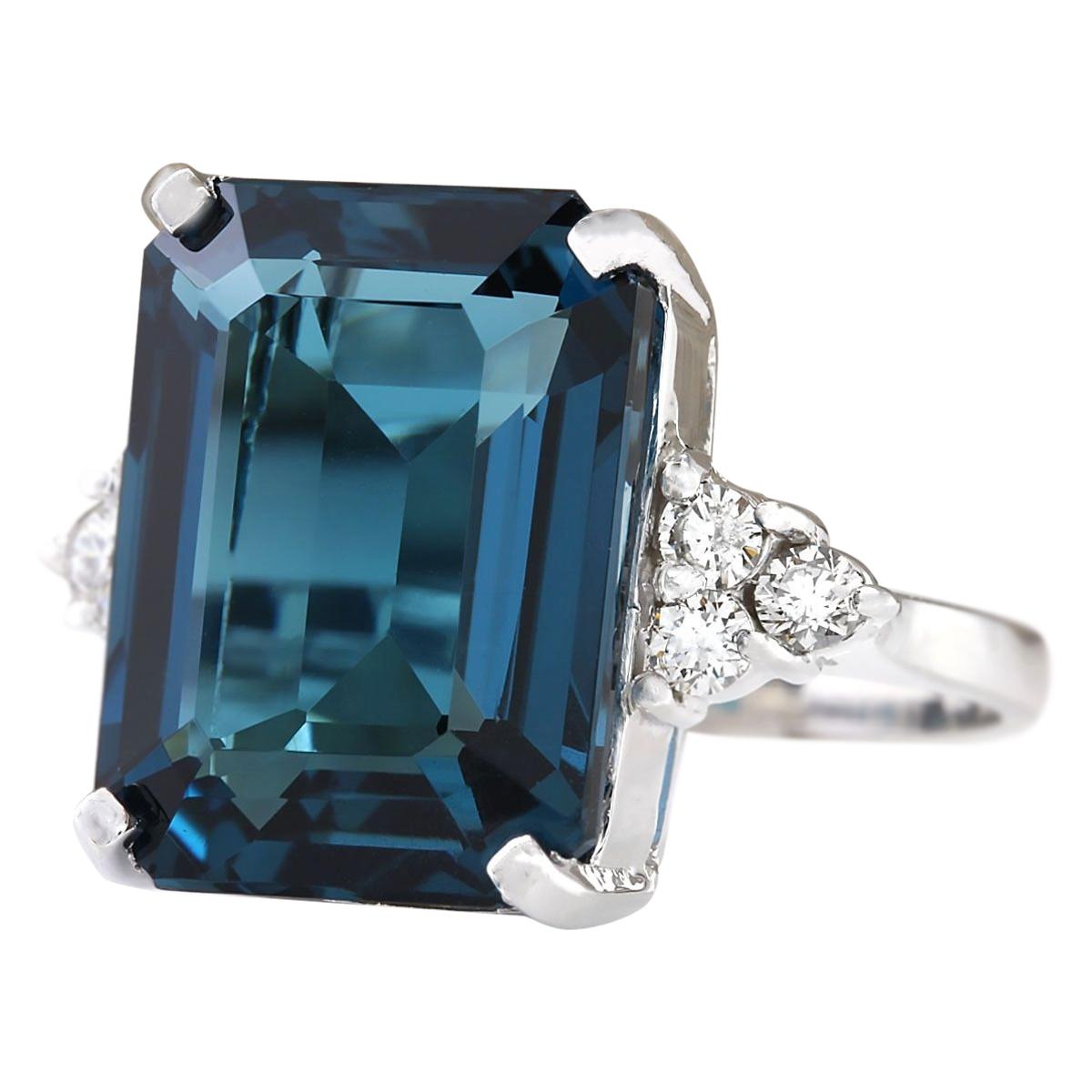 Stamped: 14K White Gold
Total Ring Weight: 8.0 Grams
Total Natural Topaz Weight is 12.74 Carat (Measures: 16.00x12.00 mm)
Color: London Blue
Total Natural Diamond Weight is 0.30 Carat
Color: F-G, Clarity: VS2-SI1
Face Measures: 16.00x20.40 mm
Sku: