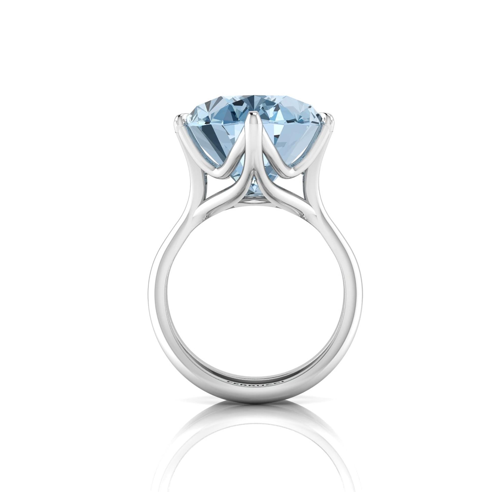 An approximate stunning 13.05 carat Oval Aquamarine, set in a uniquely designed  18k white gold ring, made with the best Italian craftsmanship,  a splendid blue mineral.
Entirely made in New York City a unique piece of art, Aquamarine encourages the