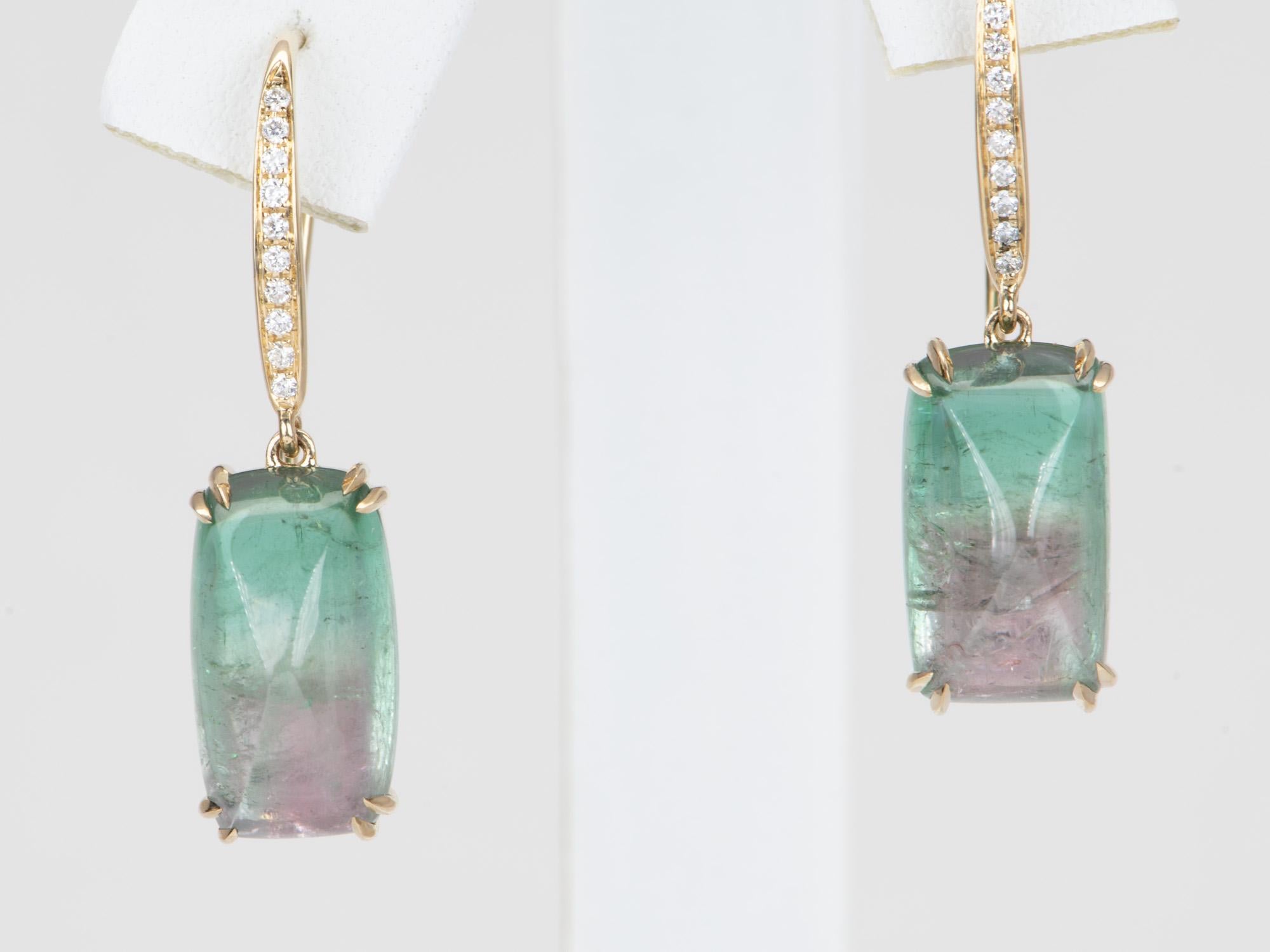 Indulge in the beauty of these Bi-Color Tourmaline Sugarloaf Dangle Earrings. Crafted with transparent and vibrant tourmaline crystals with a striking bi-color effect, they will be sure to draw compliments! A perfect choice to make a statement, made