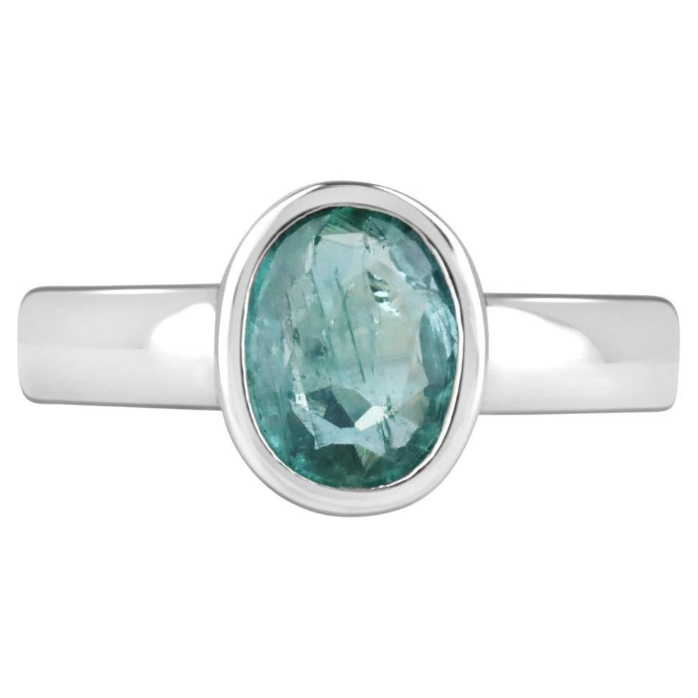 1.30ct Bluish Green Oval Emerald Bezel Set Solitaire Ring in Silver
