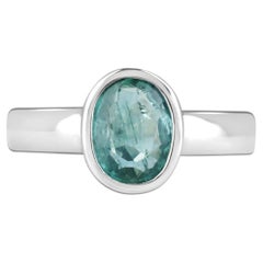 1.30ct Bluish Green Oval Emerald Bezel Set Solitaire Ring in Silver