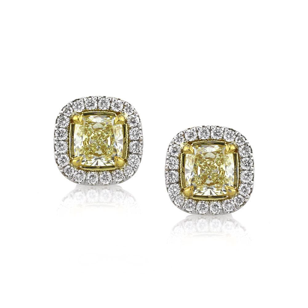1.30ct Fancy Light Yellow Cushion Cut Diamond Halo Stud Earrings For Sale