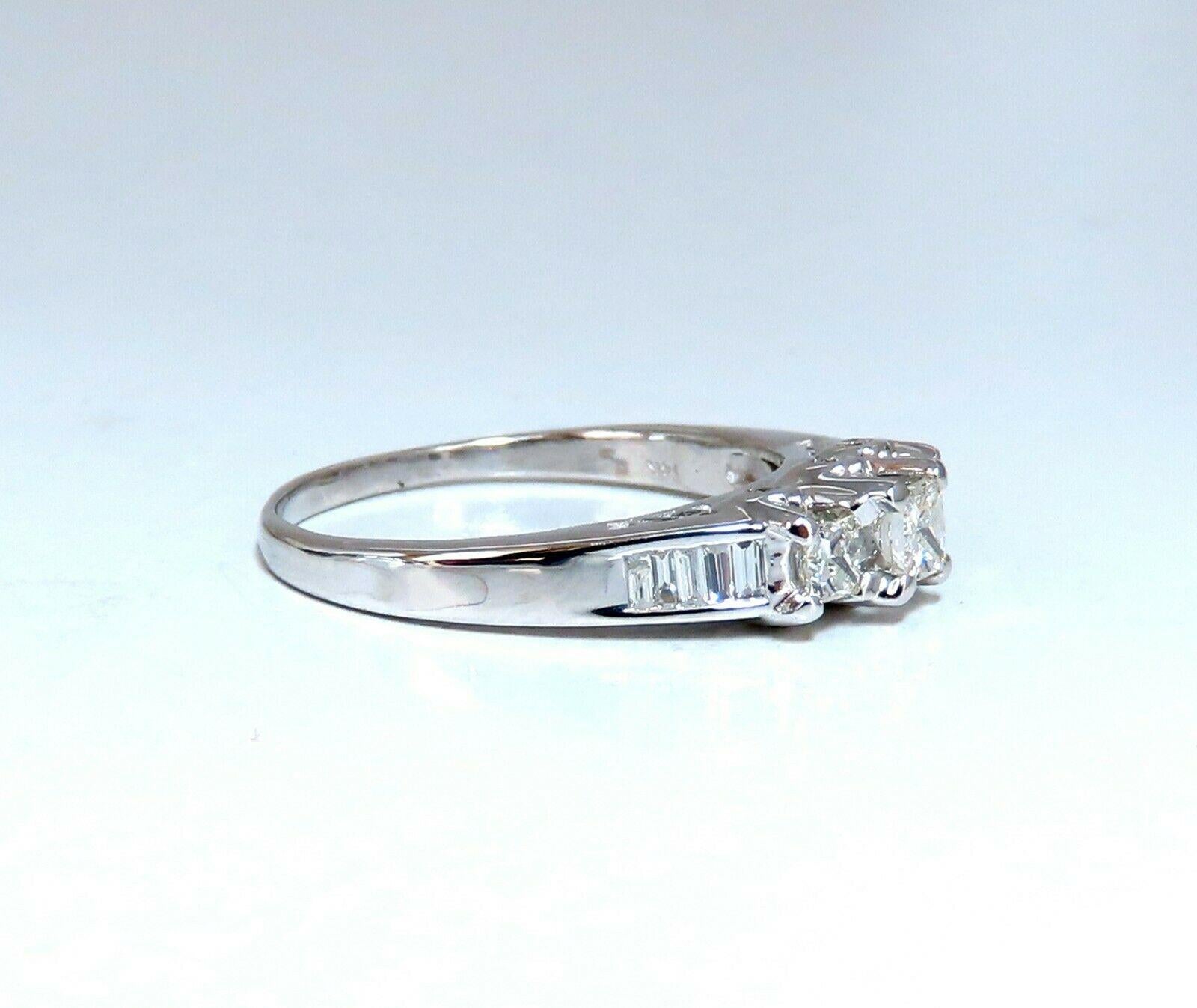 Rounds Classic Three.

1.30ct. Natural Round diamonds Ring

Center: .80ct

Total Sides: .50ct.

H-color, vs-2 clarity

14kt. white gold. 

5.9 grams.

Ring is 6.1mm wide

Depth: 8mm

current ring size: 11.5

Free overnight shipping.

$5000 Appraisal