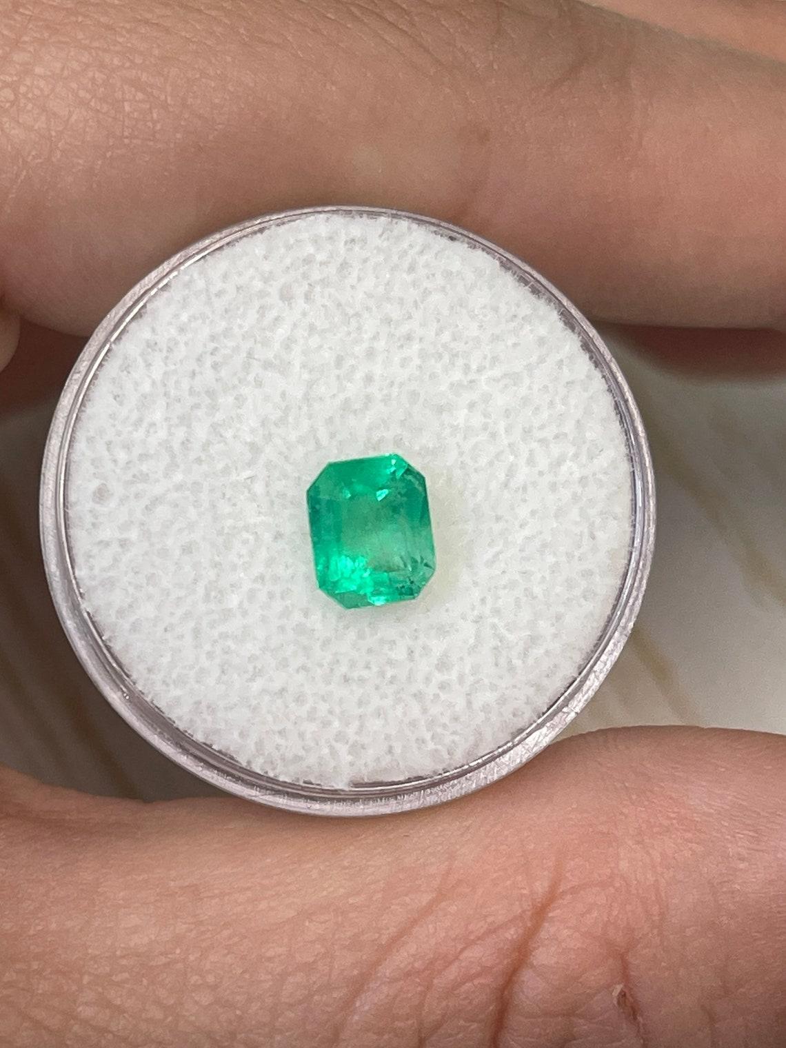 Modern 1.30ct Neon Yellowish Green Colombian Emerald 7x6mm Emerald Cut Genuine May