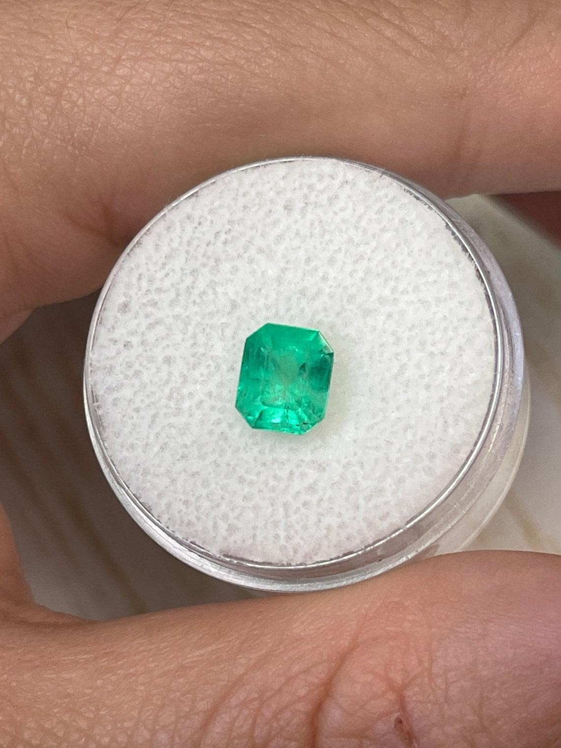 1.30ct Neon Yellowish Green Colombian Emerald 7x6mm Emerald Cut Genuine May In New Condition In Jupiter, FL