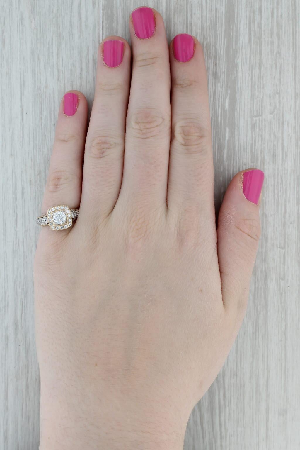 Gemstone Information:
- Natural Diamond (center) -
Carats - 0.74ct 
Cut - Round Brilliant
Color - E
Clarity - SI2
GIA # - 2201293815 

- Natural Diamonds (accents) -
Total Carats - 0.24ctw
Cut - Round Brilliant
Color - F - G
Clarity - VS2 - SI1

 -