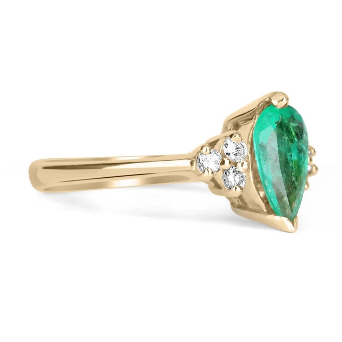 This ring features a 1.10-carat natural emerald, pear cut set in a secure two V prong setting, this extraordinary emerald has a stunning green color and very good eye clarity, Minor imperfections are normal for genuine Colombian emeralds. Three