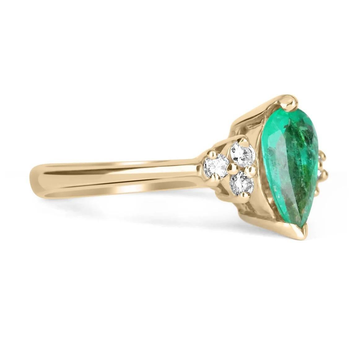 This ring features a 1.10-carat natural Colombian emerald, pear cut from the famous Muzo mines. Set in a secure two-prong setting, this extraordinary emerald has a stunning green color and very good eye clarity, Minor imperfections are normal for