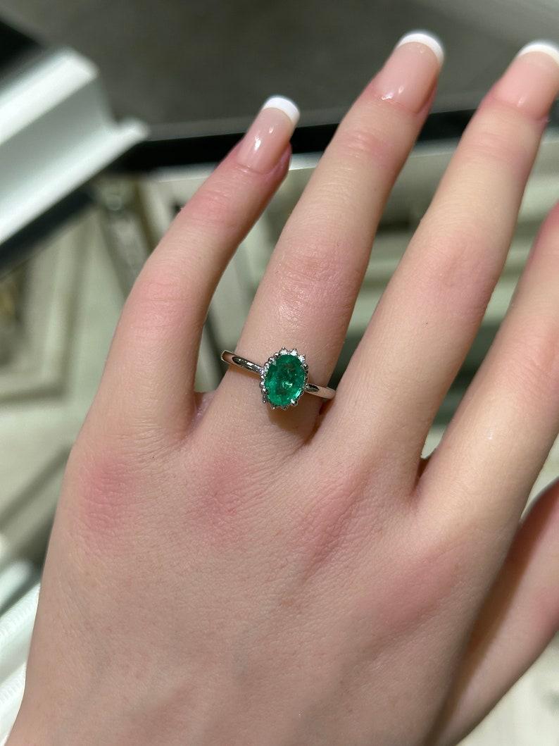 Contemporary 1.30tcw 14K Natural Oval Emerald & Diamond Accent Ring For Sale