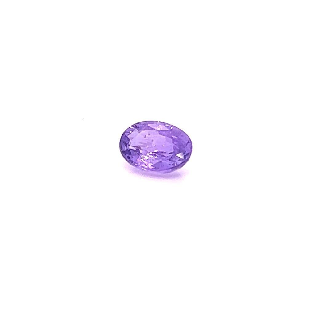 1.31 Carat Oval cut Purple Sapphire.
This exquisite Oval cut Purple Sapphire weighs 1.31 carats and has alluring, vivid purple hues.
It measures 7.4mm by 5.4mm by 3.6mm, and has a lovely spread.

It is the perfect candidate for a collection of
