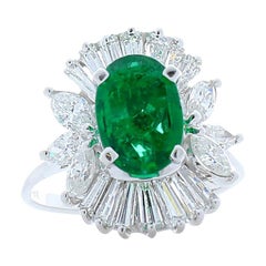 1.31 Carat Oval Emerald, Marquise 
Baguette Diamond Cocktail Ring in White Gold