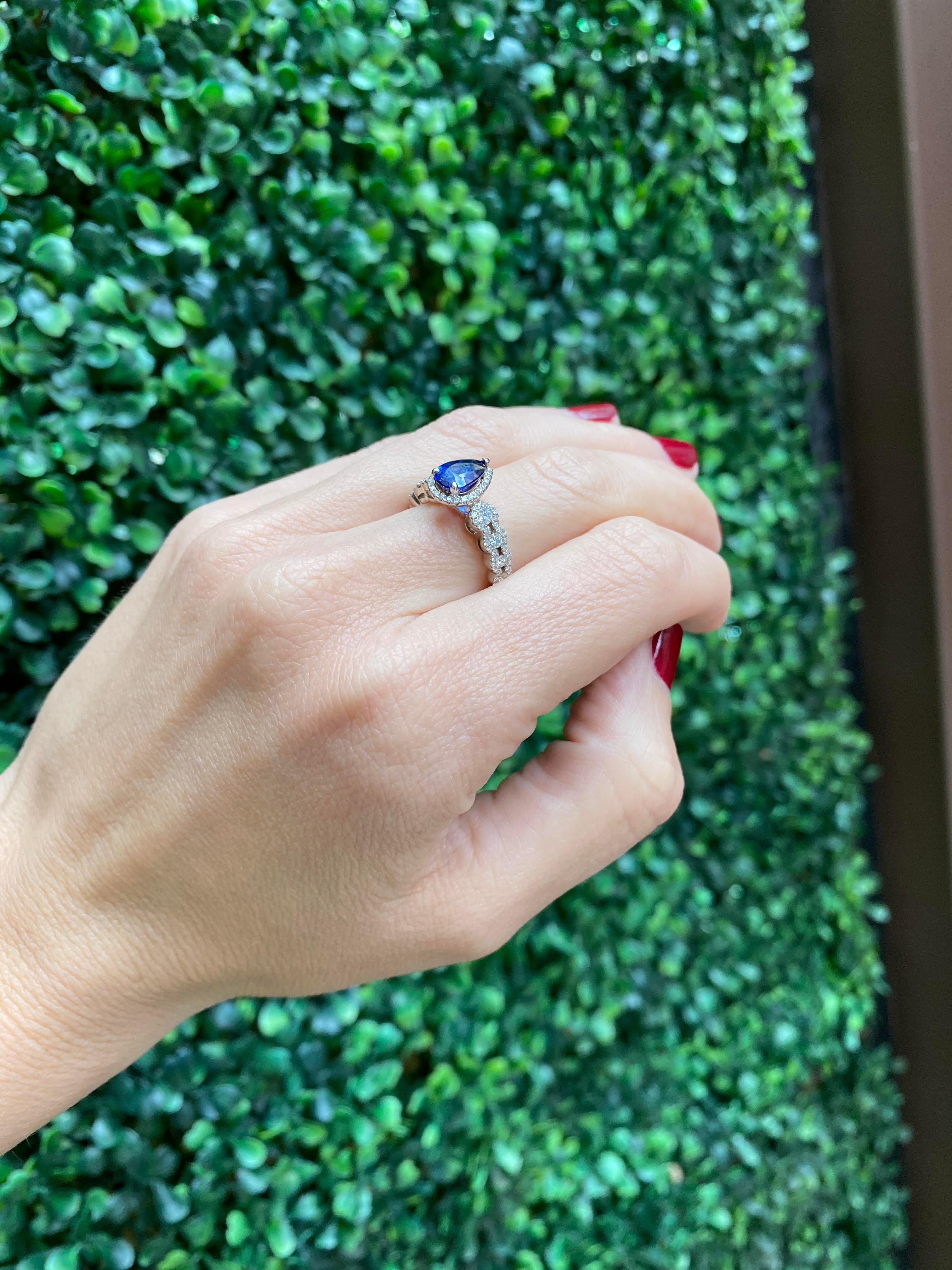 1.31 Carat Pear Shape Blue Sapphire Cocktail Ring with Diamond Halo For Sale 1