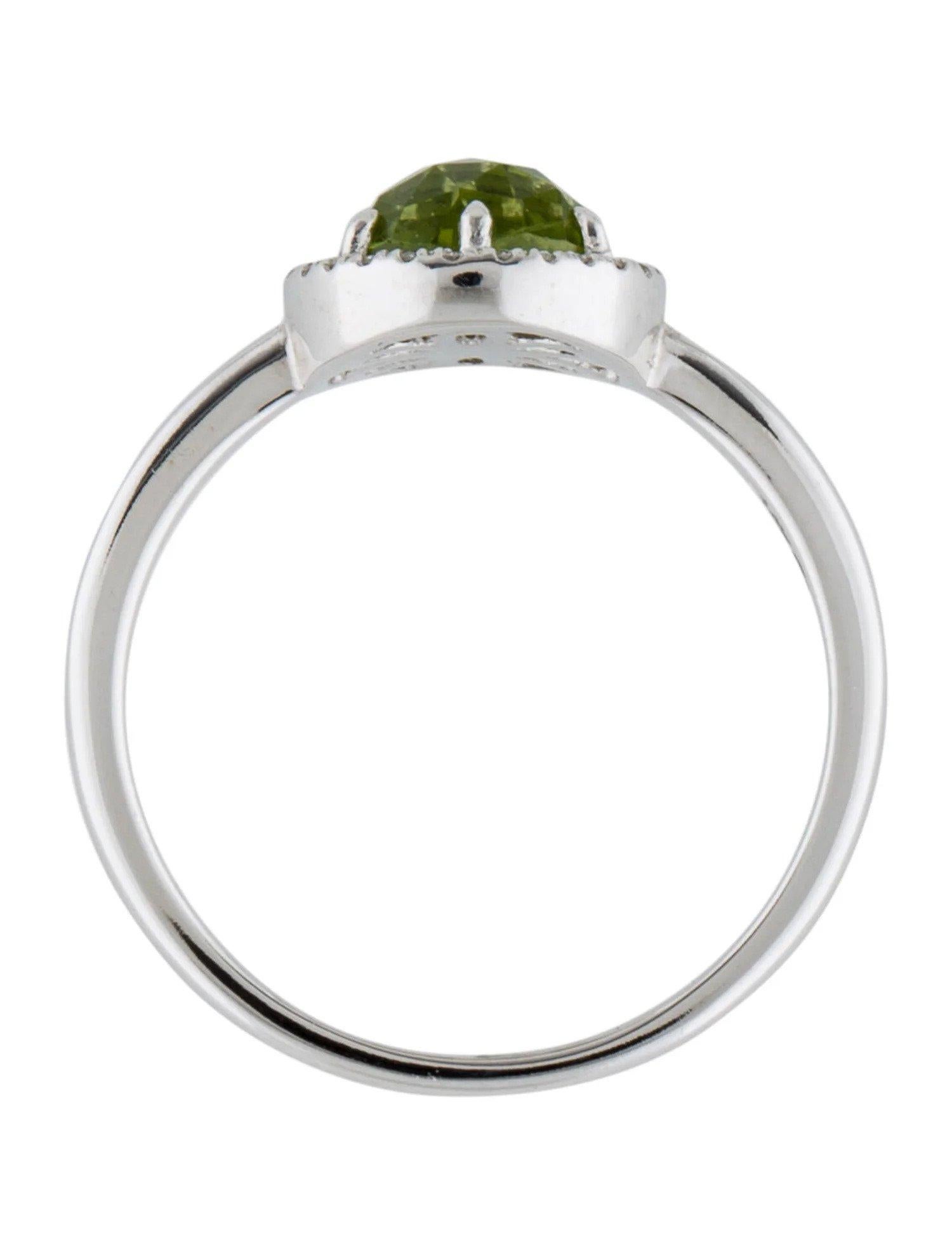 1.31 Carat Round Peridot & Diamond White Gold Ring In New Condition For Sale In Great Neck, NY