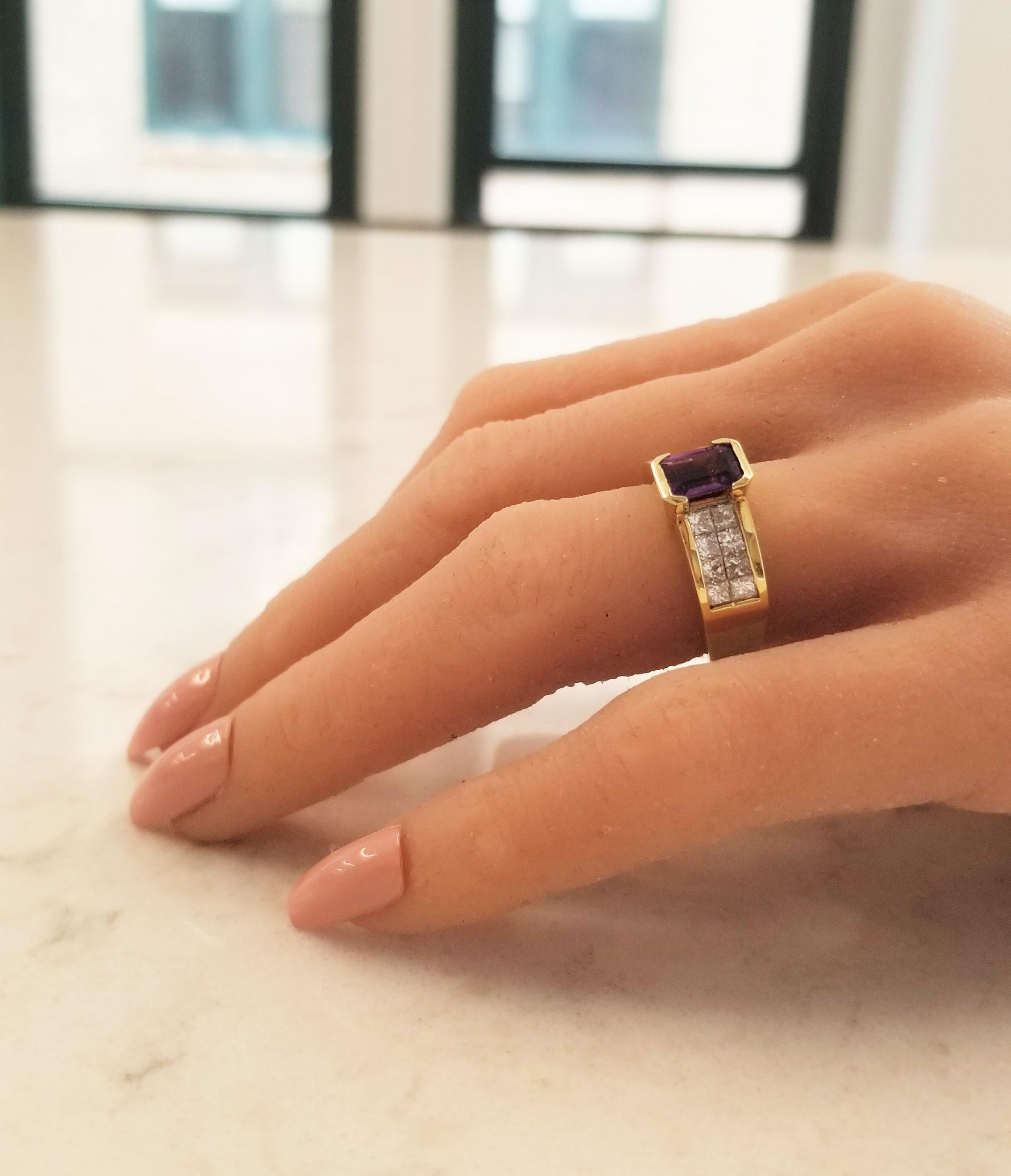 Exceptionally regal and ravishingly elegant. This 18 Karat yellow gold amethyst and diamond ring delivers on style points. The amethyst is originating from Brazil. Dazzling invisible set princess cut diamonds (F-G color; VS clarity) set this ring