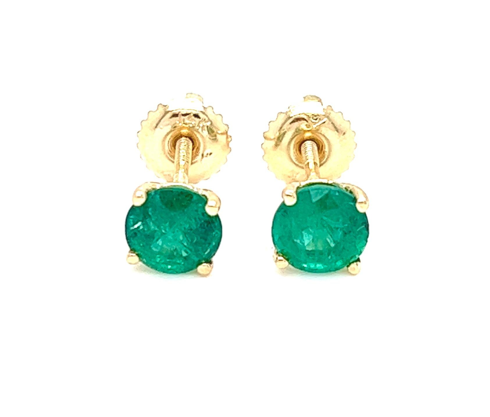 Elegant 14K Yellow Gold Emerald Stud Earrings

Description:
Indulge in the timeless allure of natural earth-mined emeralds with these stunning 14K yellow gold stud earrings. Each earring features a round brilliant-cut emerald measuring about 5.75mm