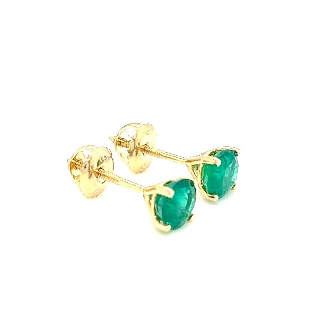 Women's or Men's 1.31 carats round Emerald Stud Earrings in 14K Yellow Gold. For Sale