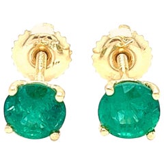 Orecchini con smeraldo rotondo da 1,31 carati in oro giallo 14K.