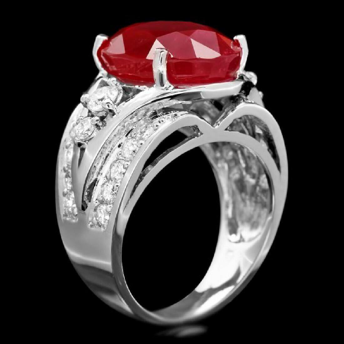 13.10 Carats Impressive Natural Red Ruby and Diamond 14K White Gold Ring

Total Red Ruby Weight is Approx. 12.00 Carats (Lead Glass Filled)

Ruby Measures: Approx. 14.00 x 11.00mm

Natural Round Diamonds Weight: Approx. 1.10 Carats (color G-H /