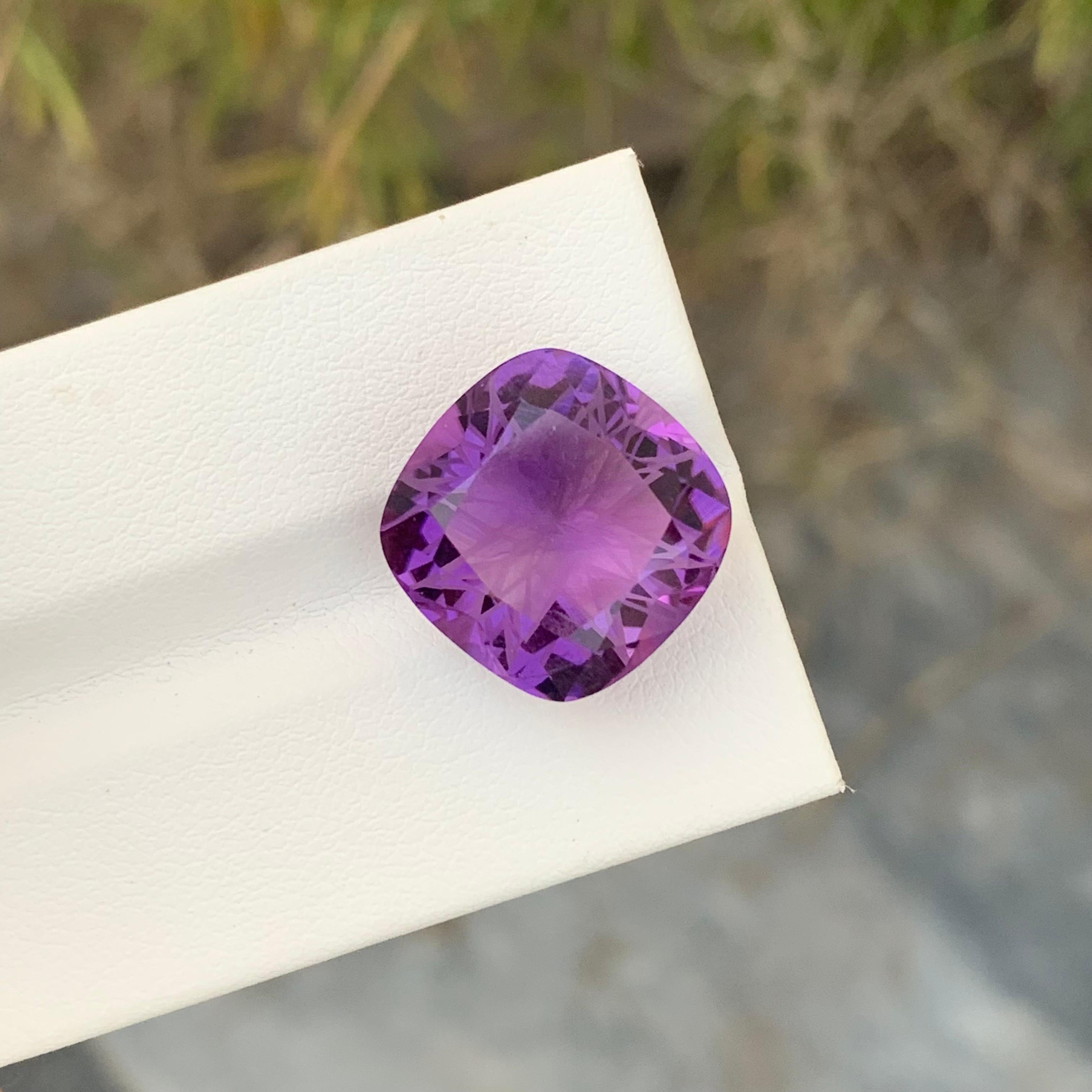 Loose Amethyst
Weight: 13.10 Carats
Dimension: 15.3 x 15.1 x 9.5 Mm
Colour: Purple
Origin: Brazil
Treatment: Non
Certificate: On Demand
Shape: Cushion 

Amethyst, a stunning variety of quartz known for its mesmerizing purple hue, has captivated