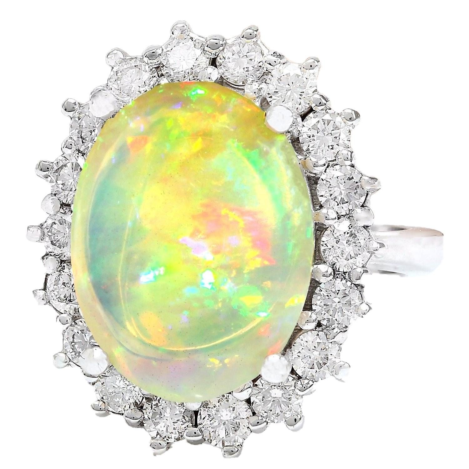 13.10 Carat Natural Opal 14K Solid White Gold Diamond Ring
 Item Type: Ring
 Item Style: Cocktail
 Material: 18K White Gold
 Mainstone: Opal
 Stone Color: Multicolor
 Stone Weight: 11.70 Carat
 Stone Shape: Oval
 Stone Quantity: 1
 Stone Dimensions: