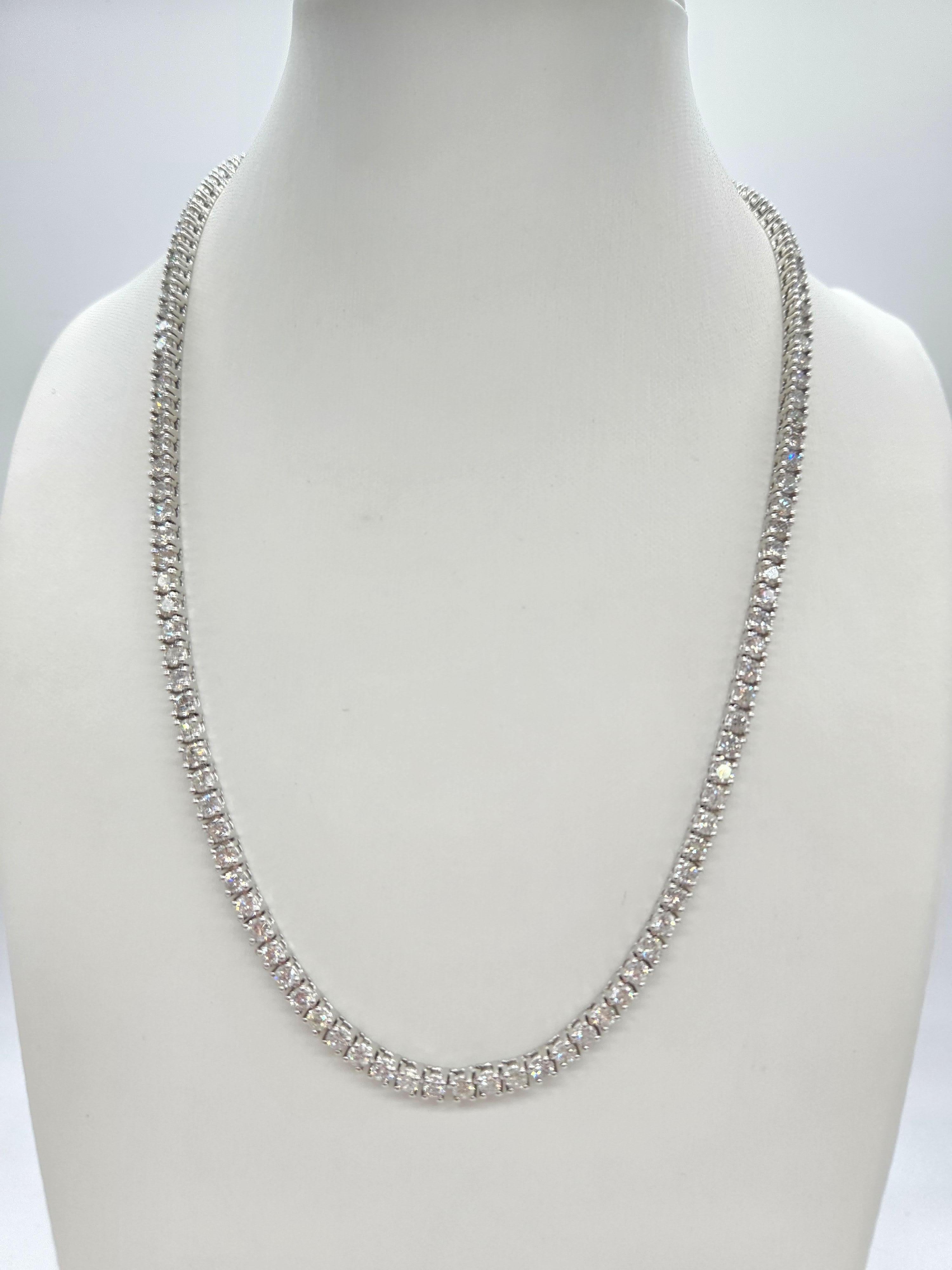 Beautiful quality tennis necklace, round-brilliant cut white diamonds clean and excellent shine!

Carat Weight: 13.10 cts
14k solid white gold
Style: Classic four-prong style for maximum light brilliance. Length: 16 inch 
Average Color: F
Average