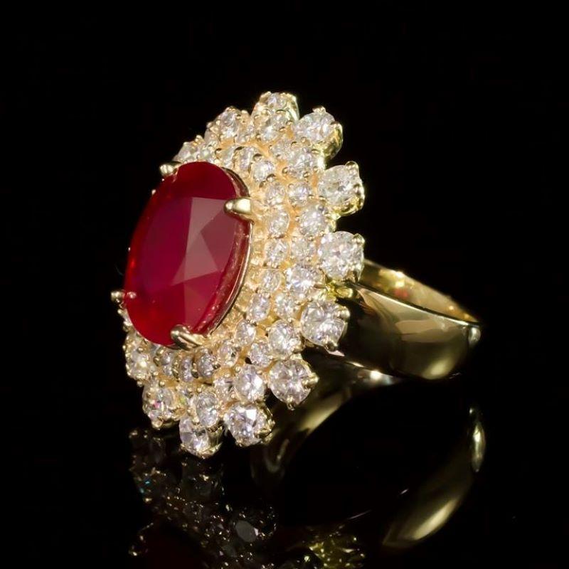 13.10 Carats Impressive Red Ruby and Natural Diamond 14K Yellow Gold Ring

Total Red Ruby Weight is: Approx. 9.30 Carats

Ruby Measures: Approx. 14.00 x 12.00mm

Ruby treatment: Fracture Filling

Natural Round Diamonds Weight: Approx. 3.80 Carats