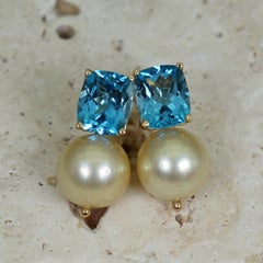 13.12 Carat Blue Topaz and Champagne Pearl 14 Karat Gold Drop Stud Earrings