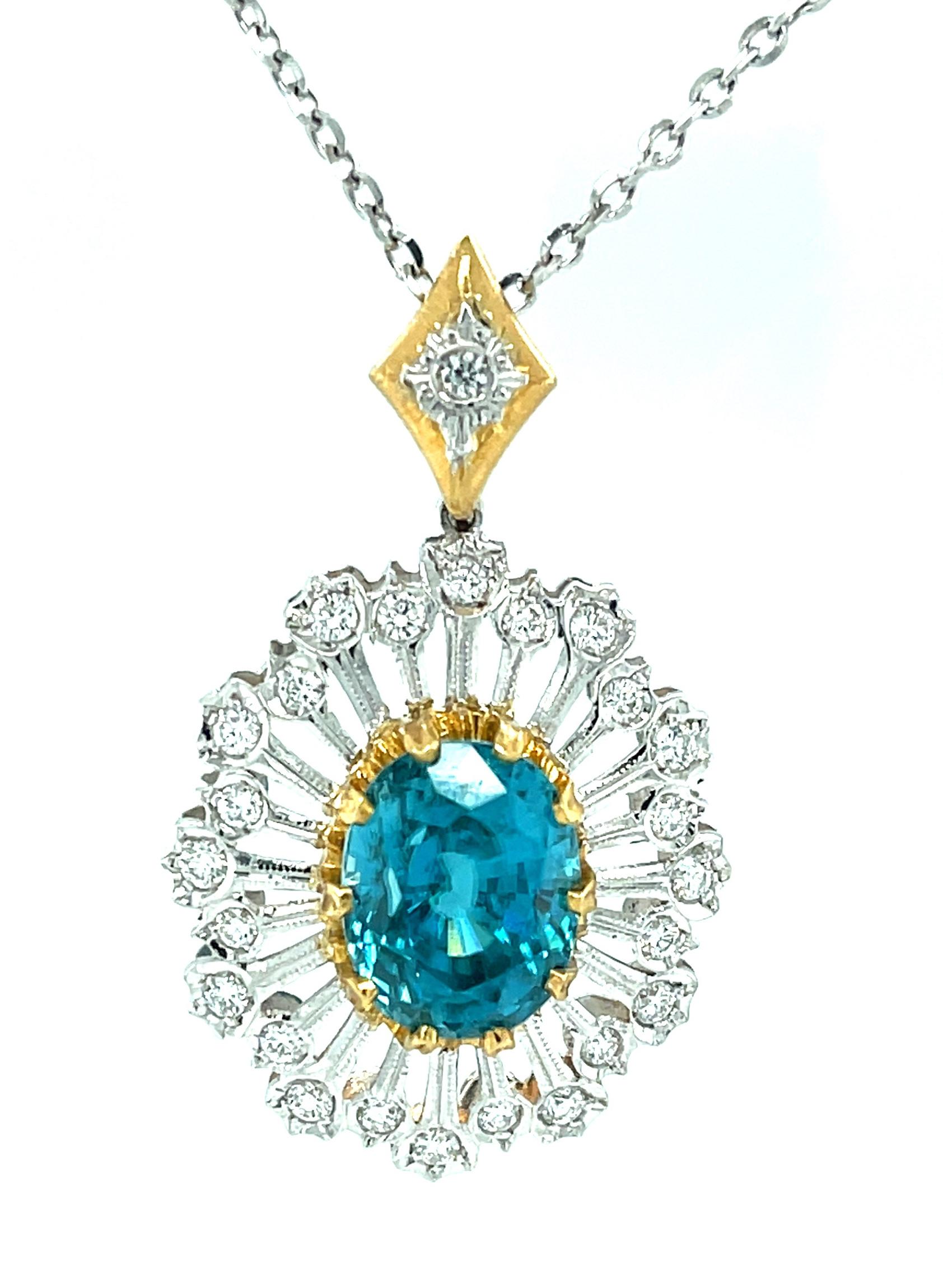 Made in Italy in a Florentine style, this handcrafted blue zircon and diamond pendant is truly stunning! Blue zircon has been popular since the late Victorian era due to its gorgeous blue hue, brilliance, and fire. This extraordinary 13.12 carat gem