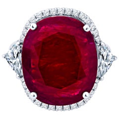 13.12 Carat Oval Cut Natural Ruby and 1.26 Carat Diamond Ring in 18 Karat Gold