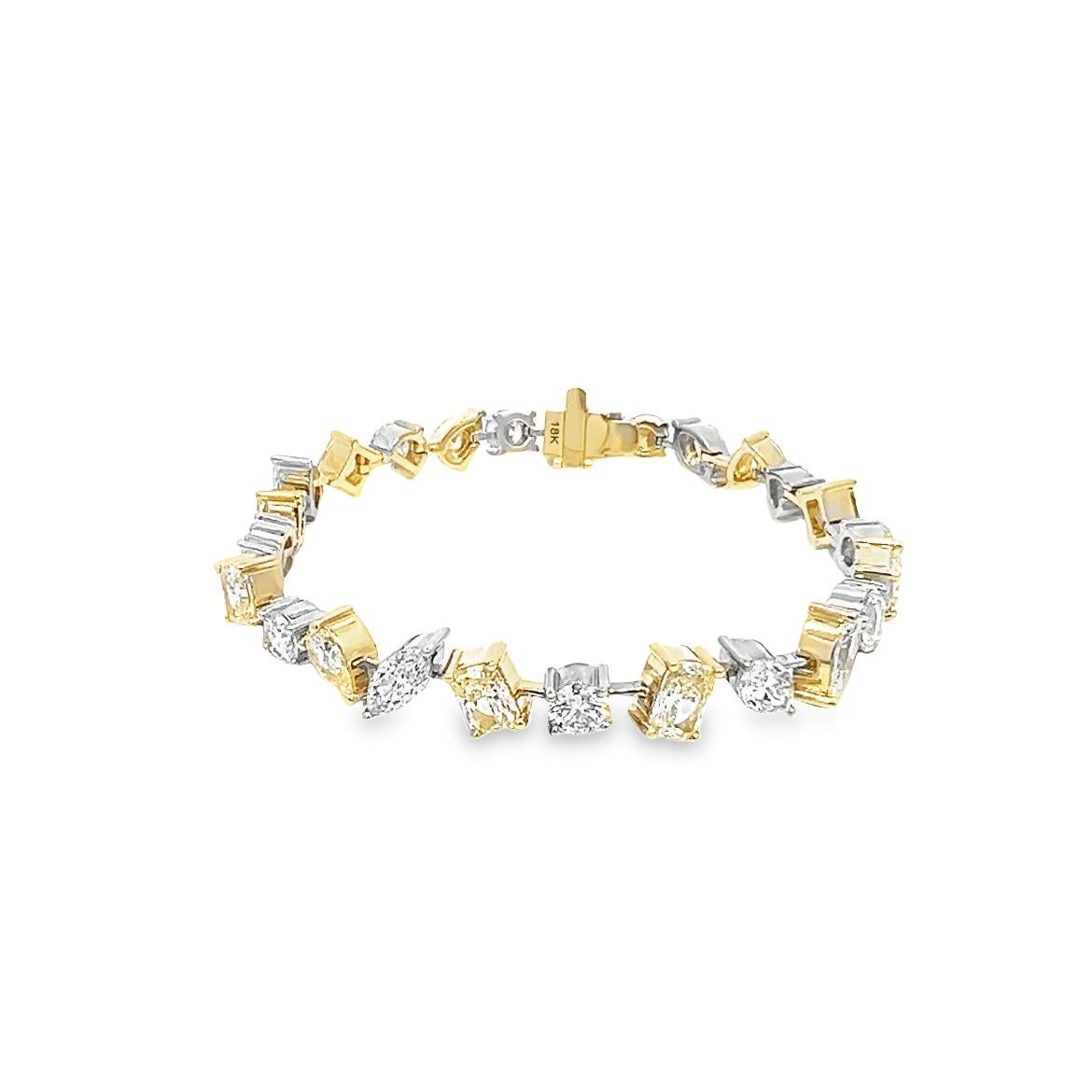 Introducing a set of exquisite handmade bracelets made from 18K yellow and 18K white gold, embedded with multiple-shaped diamonds that total 13.12 carats. This unique piece boasts 13 fancy yellow diamonds (fancy light-intense), along with 12 regular