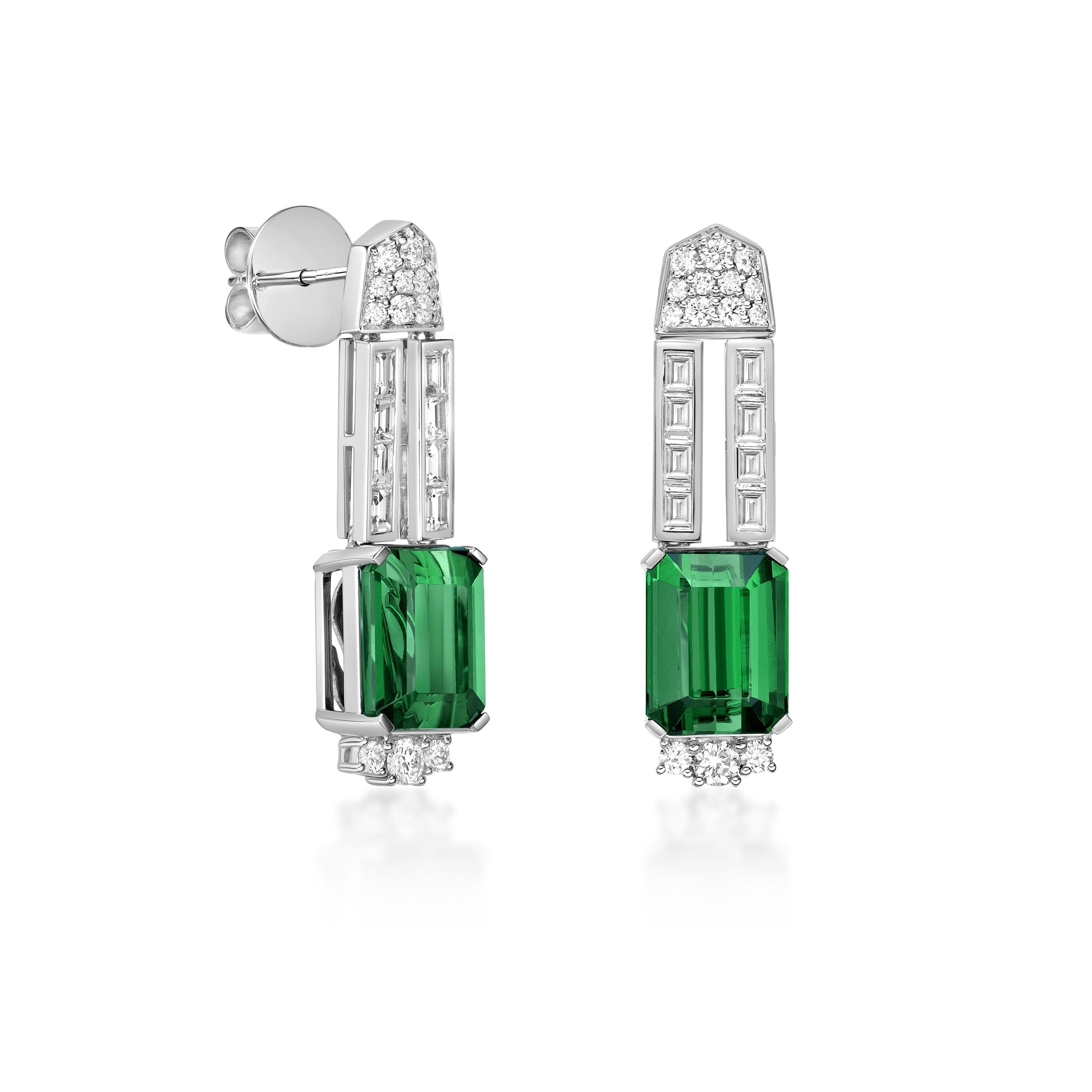 This collection features an array of Green Tourmaline with a Green hue that is as cool as it gets! Accented with diamonds these earrings are made in white gold and present a classic yet elegant look.

Green Tourmaline Drop Earrings in 18 Karat White