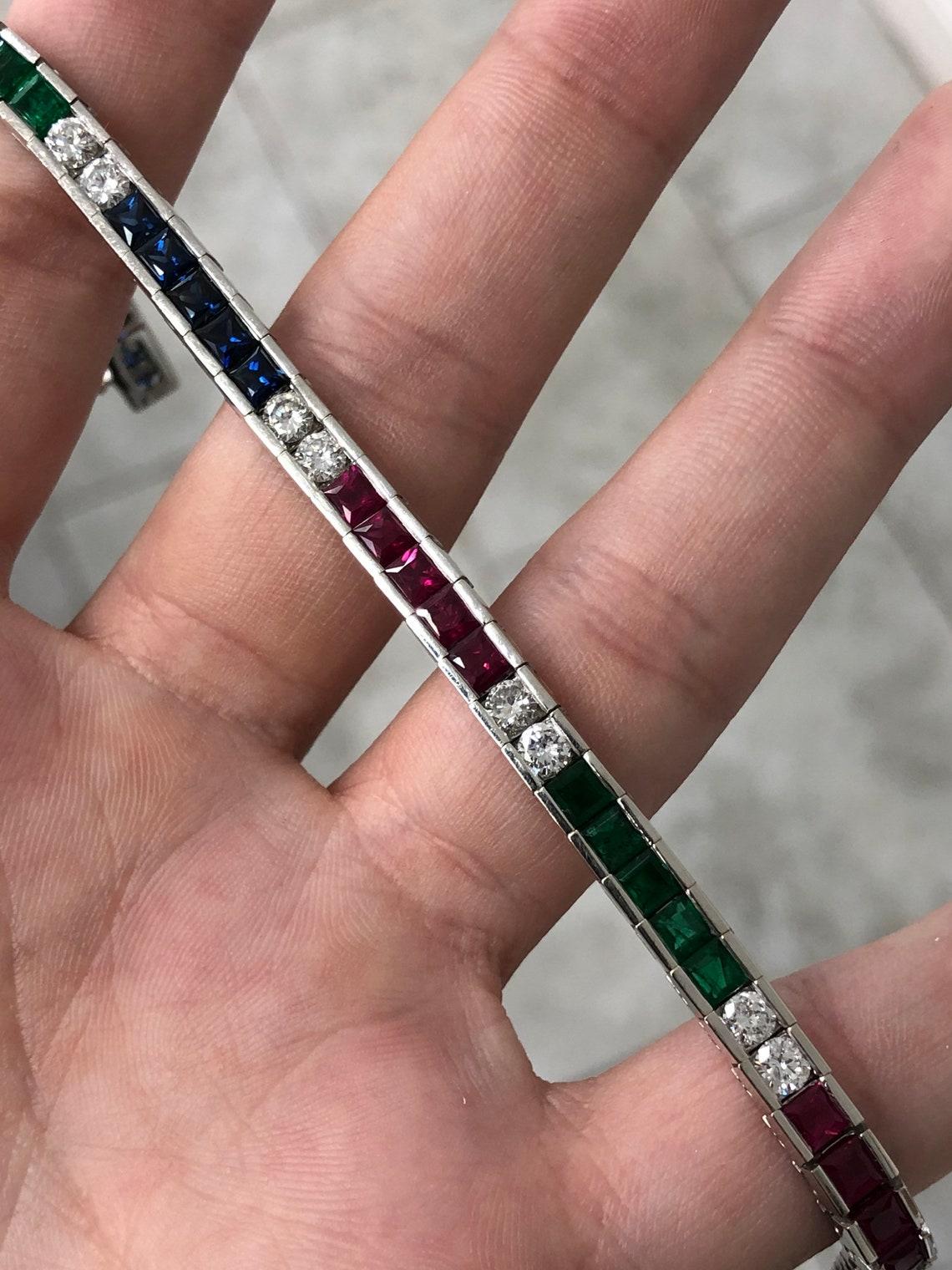 Emerald Cut 13.17ct Emerald Sapphire Ruby & Diamond Tennis Bracelet – 14K White Gold For Sale
