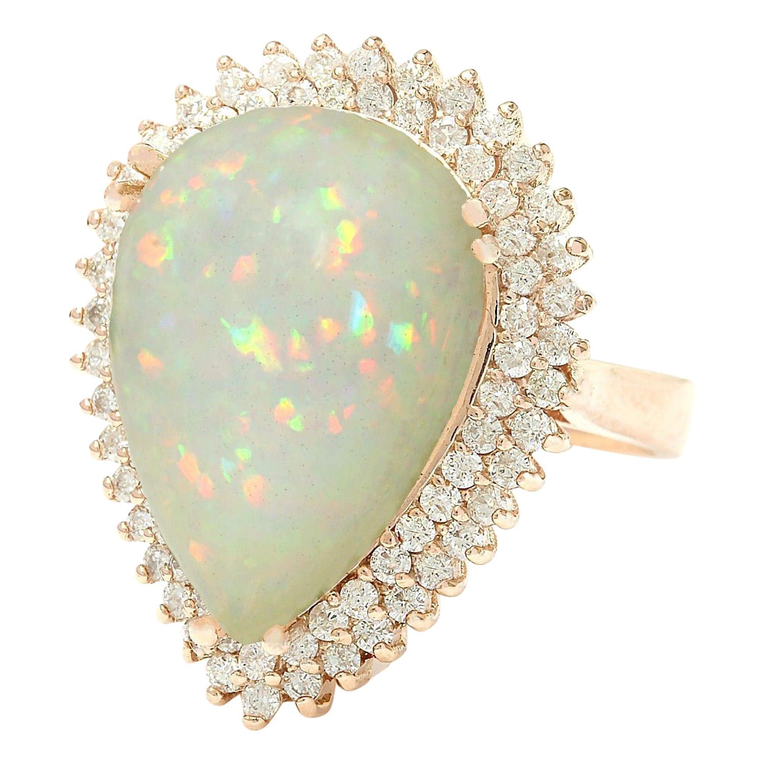 13.18 Carat Natural Opal 14K Solid Rose Gold Diamond Ring
 Item Type: Ring
 Item Style: Cocktail
 Material: 14K Rose Gold
 Mainstone: Opal
 Stone Color: Multicolor
 Stone Weight: 12.48 Carat
 Stone Shape: Pear
 Stone Quantity: 1
 Stone Dimensions: