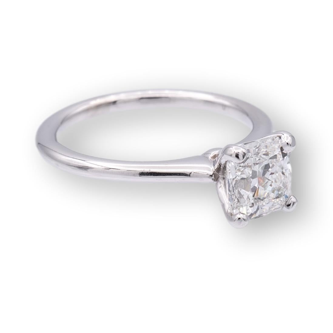 Engagement ring from the Astor collection by Blue Nile featuring a center cushion brilliant diamond weighing 1.31 cts. F color , VS2 clarity certified by the GIA (Gemological Institute of America) with excellent polish and symmetry finely crafted in