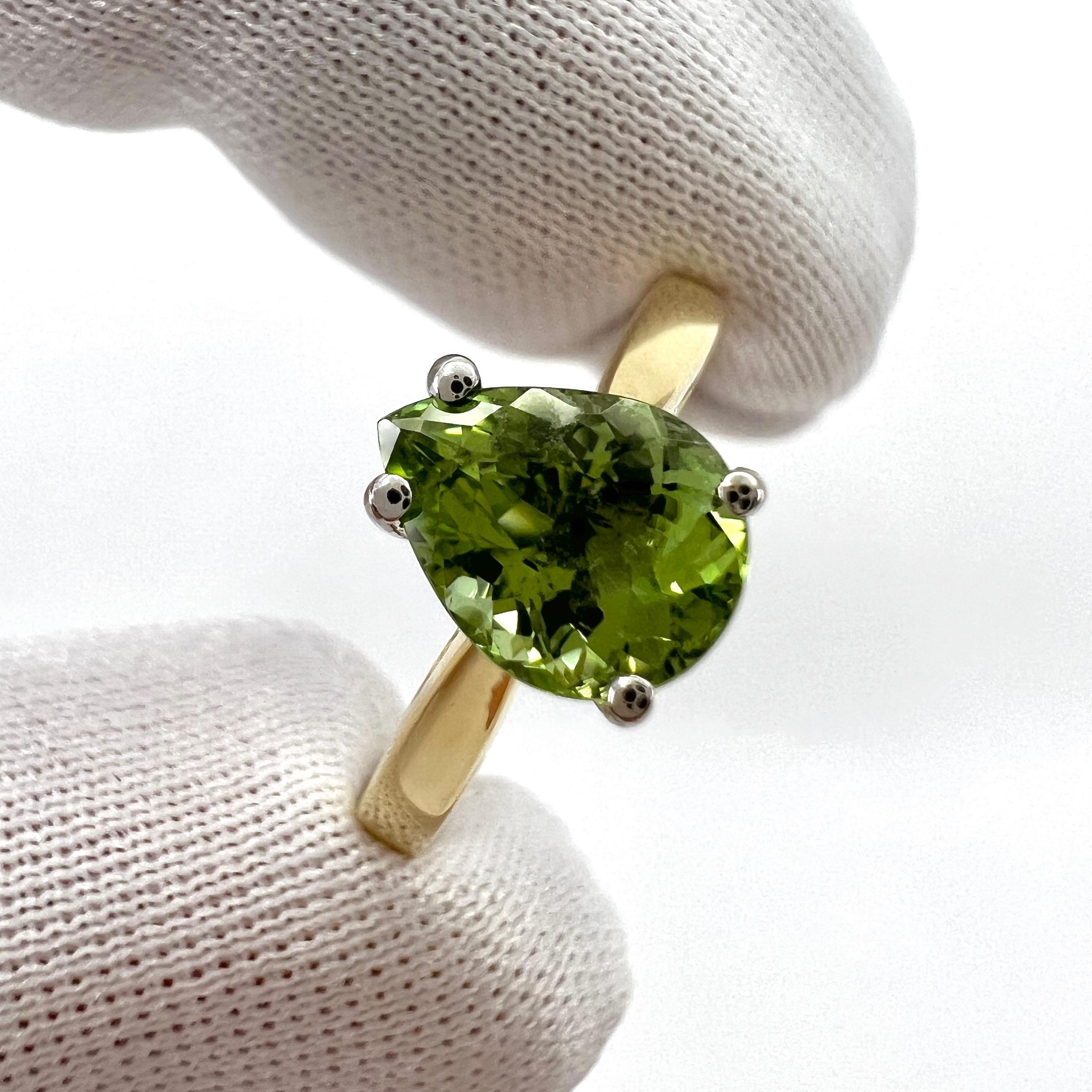 Light Green Tourmaline Pear Cut 18k Yellow And White Gold Solitaire Ring.

1.31 Carat tourmaline with a stunning light green colour and good clarity. Clean stone, with only some small natural inclusions visible when looking closely.

Also has a very