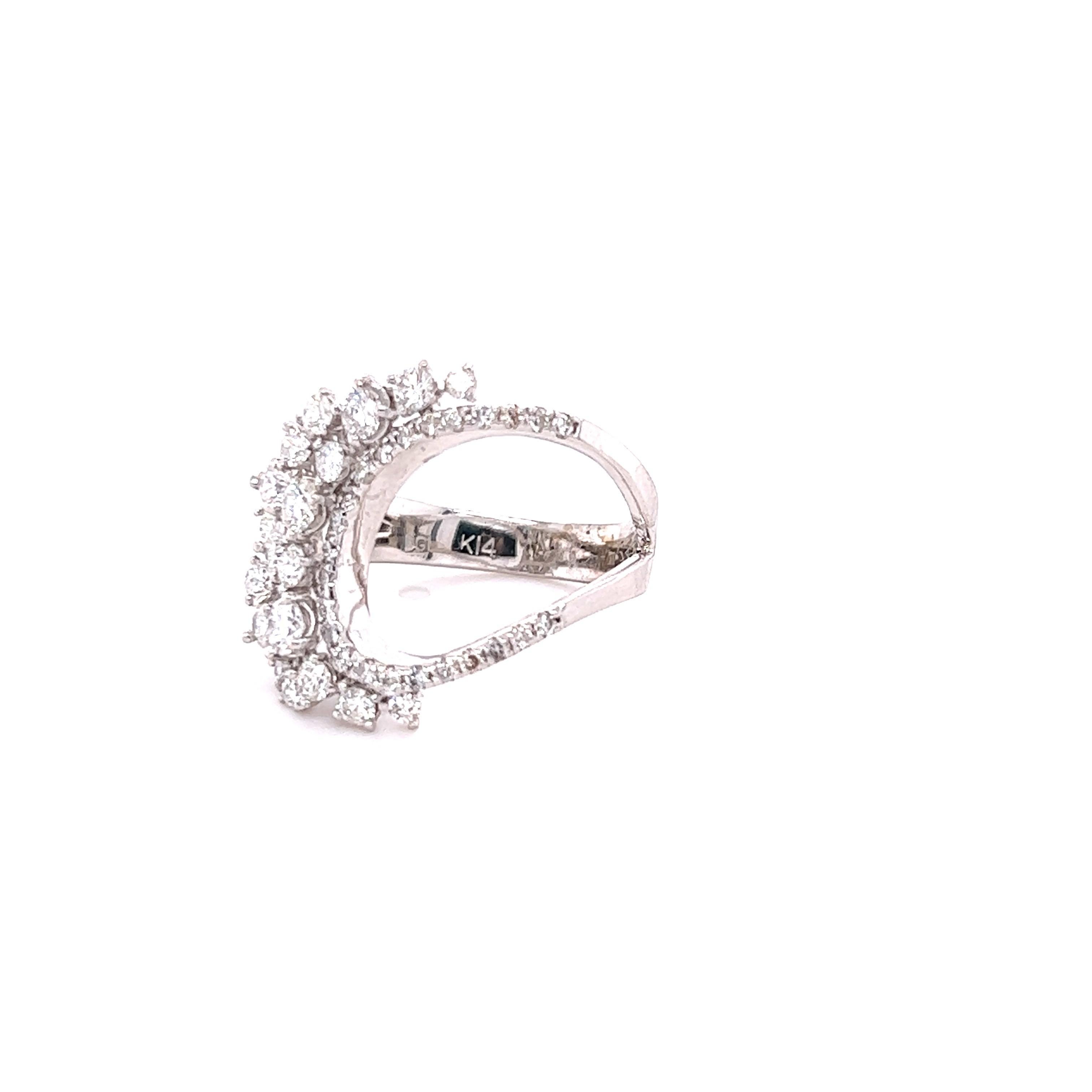 This ring has 43 Round Cut Diamonds that weigh 1.32 Carats and has a clarity and color of SI-F.  
It is crafted in 14 Karat White Gold and has an approximate weight of 5.3 grams. 

The ring is a size 7 and can be re-sized at no additional charge! 