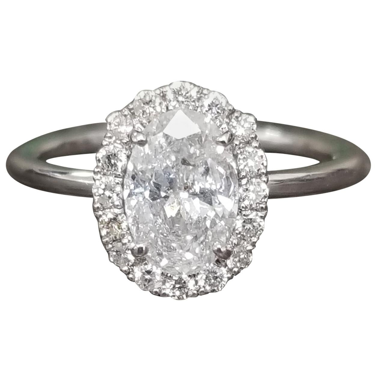 1.32 Carat Diamond Oval Halo Solitaire total weight  For Sale