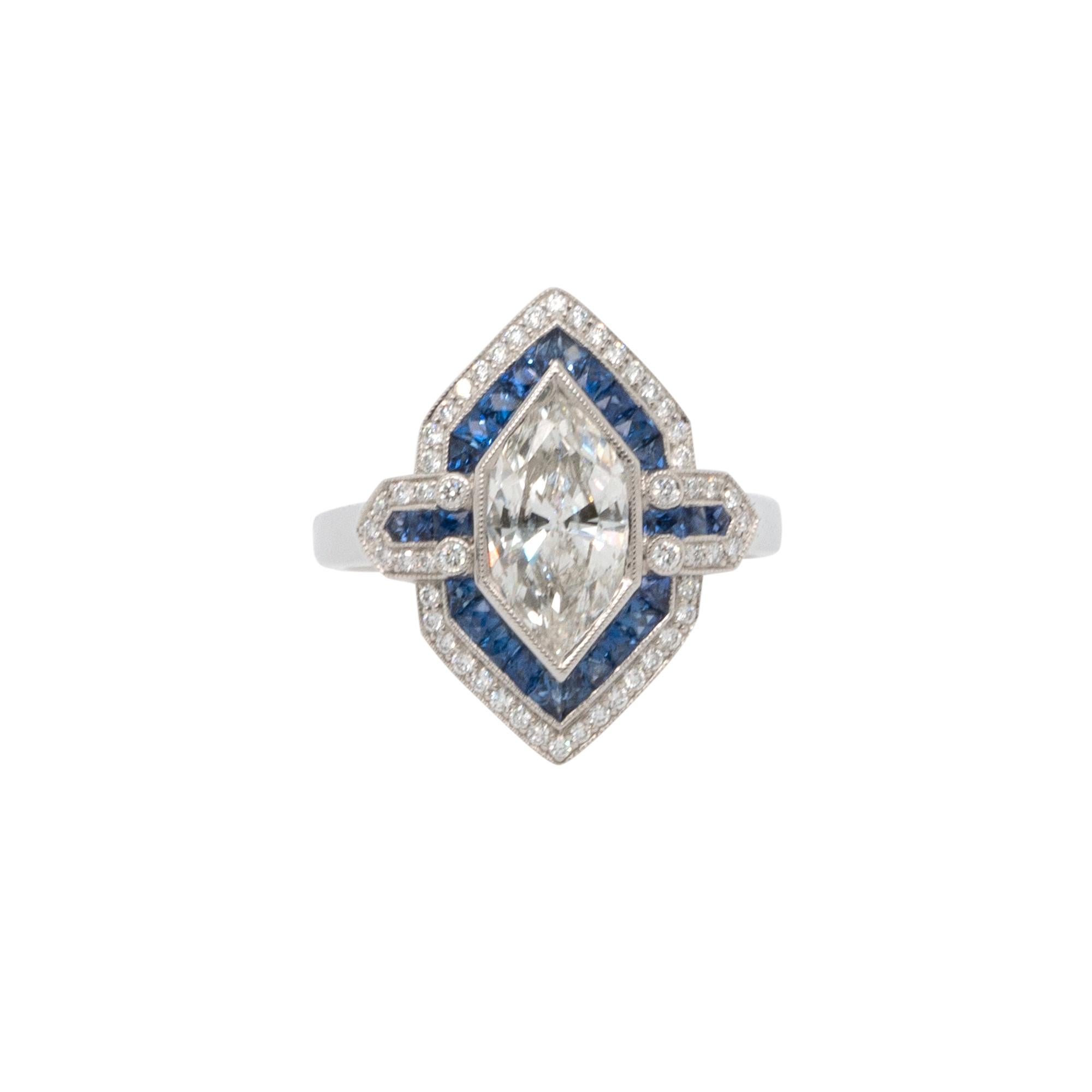 Center Details: 1.32ct Natural Marquise Cut Diamond that is J in color and SI2 in clarity

Ring Material: Platinum

Ring Details: Shield style ring with 0.19ctw of round cut Diamonds that are G/H in color and VS in clarity as well as 0.60ctw of