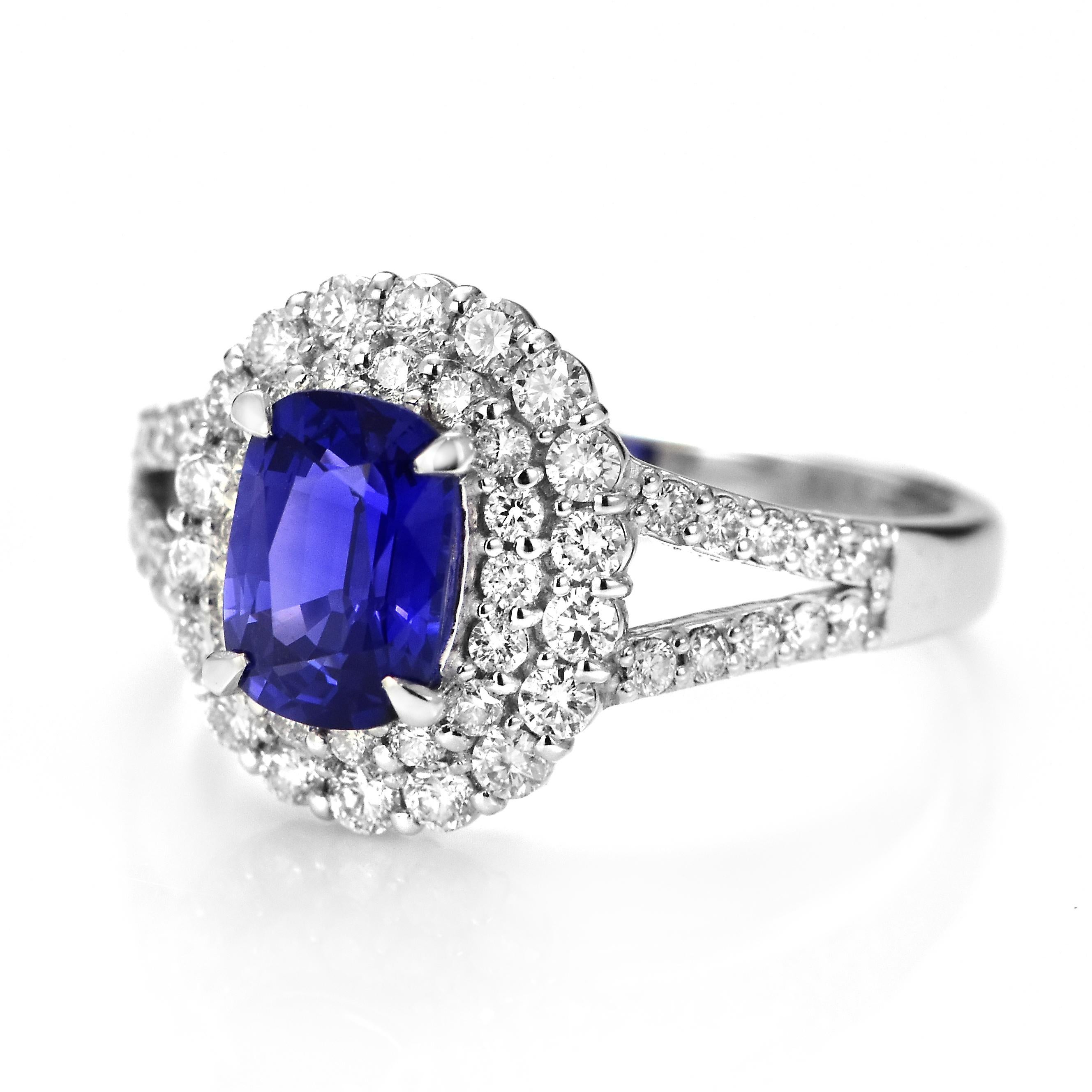 Modern 1.32 Carat Natural Velvet Blue Sapphire & Diamond Halo Set Ring Made in Platinum For Sale