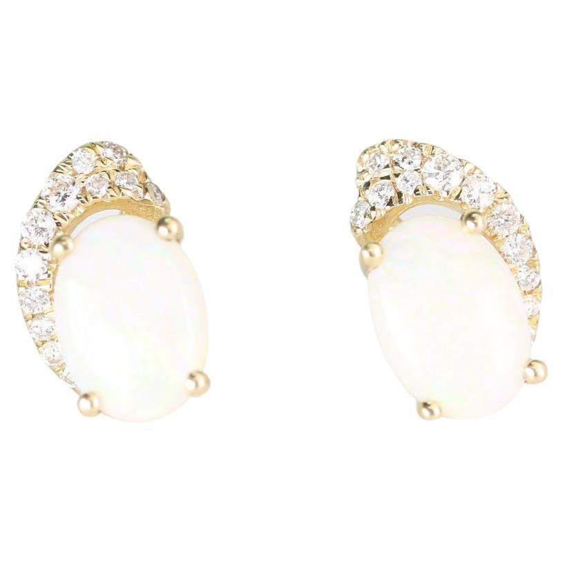 1.32 Carat Opal Oval Cab and Diamond 10K Yellow Gold Stud Earring For Sale