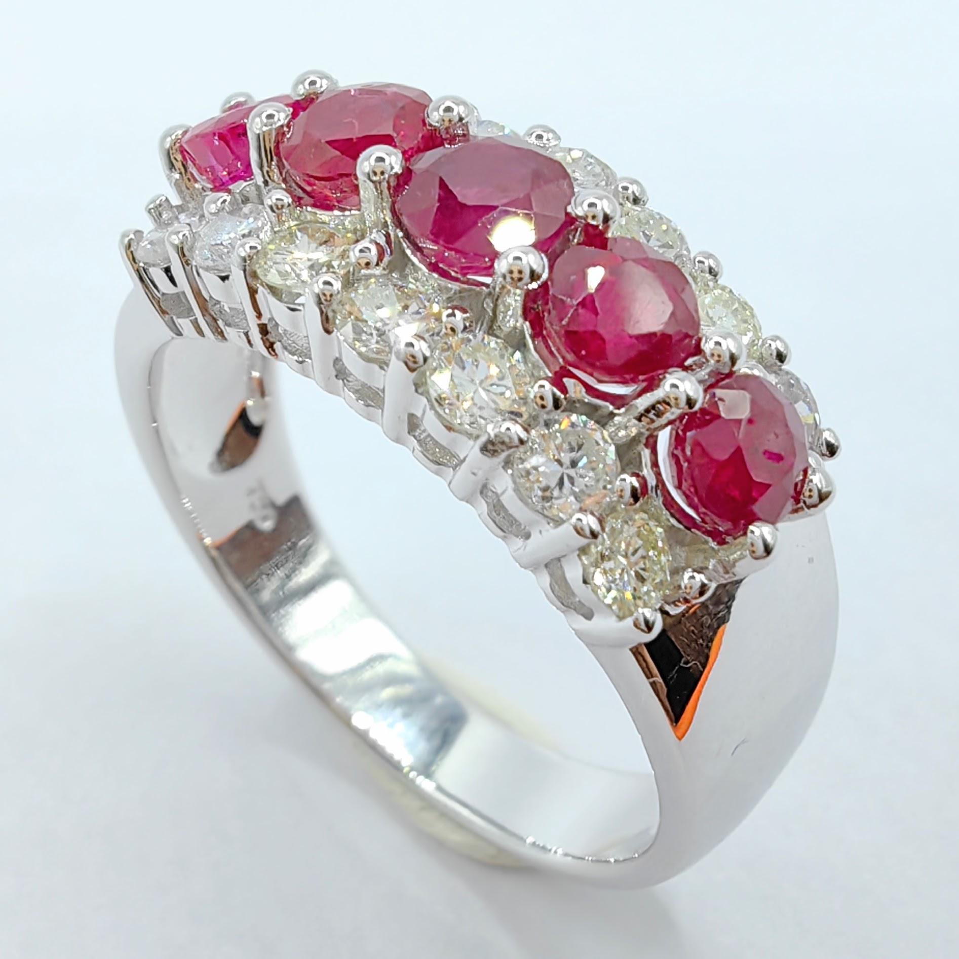 Introducing our exquisite 1.32 Carat Pigeon Blood Ruby & Diamond Half Eternity Ring, a stunning piece crafted in 18K white gold. This captivating ring showcases the mesmerizing beauty of rubies and diamonds, creating a luxurious and timeless