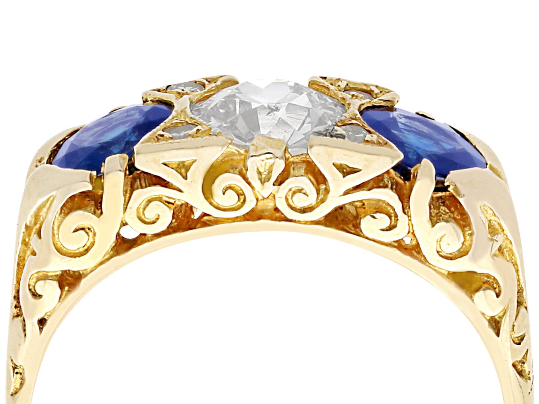 An impressive antique 1.32 carat natural sapphire and 0.81 carat diamond, 15 karat yellow gold dress ring; part of our diverse estate jewelry collections.

This fine and impressive sapphire and diamond ring has been crafted in 15k yellow gold.

The